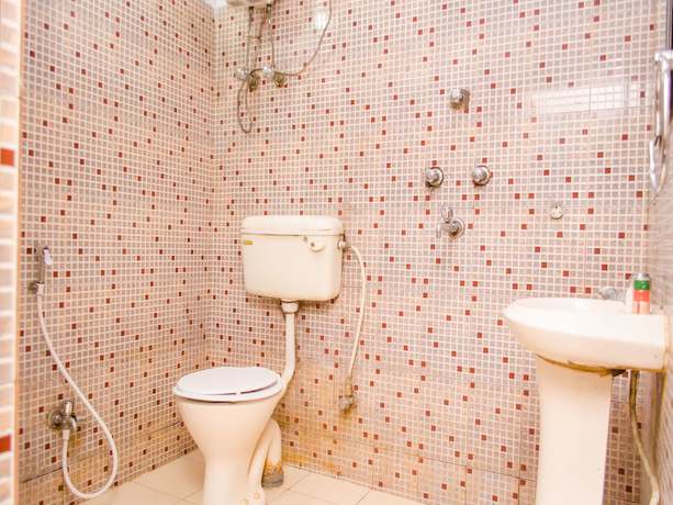 Imagen de la habitación del Hotel OYO 4144 The Banquet. Foto 12