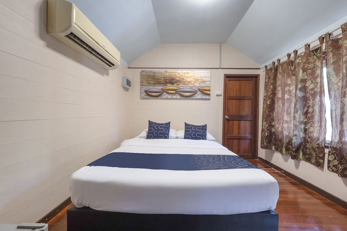 Imagen de la habitación del Hotel OYO 418 Saksaitarn Resort. Foto 9