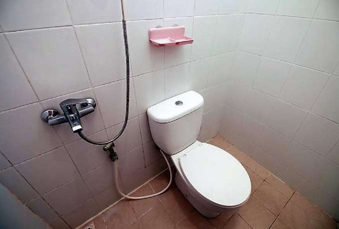 Imagen de la habitación del Hotel OYO 418 Setra House. Foto 11