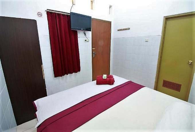 Imagen de la habitación del Hotel OYO 418 Setra House. Foto 12