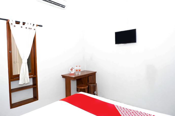 Imagen de la habitación del Hotel OYO 422 Achterhuis Guesthouse. Foto 9