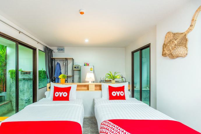 Imagen de la habitación del Hotel OYO 422 Jane Homestay And Resort. Foto 2