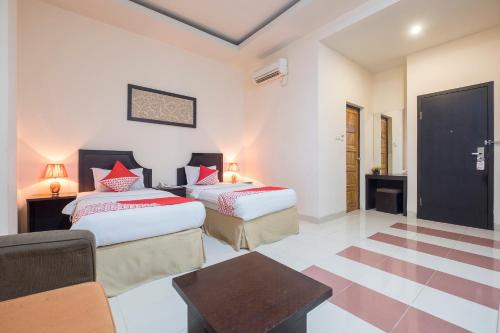 Imagen de la habitación del Hotel OYO 424 Asia Hotel. Foto 6