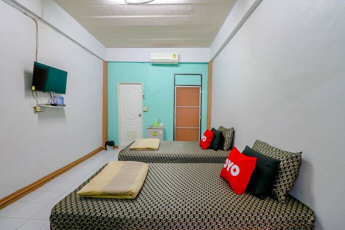 Imagen de la habitación del Hotel OYO 428 Pha Mansion. Foto 2