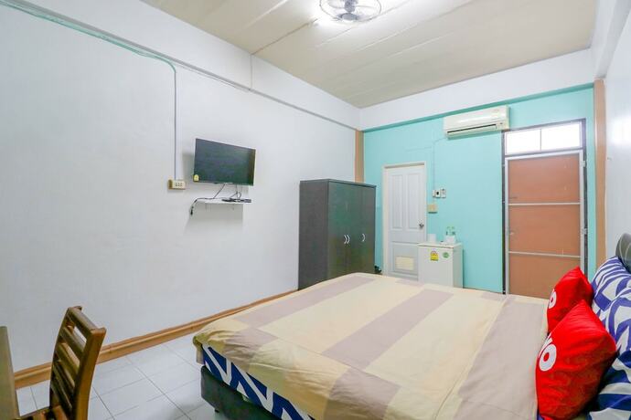 Imagen de la habitación del Hotel OYO 428 Pha Mansion. Foto 3