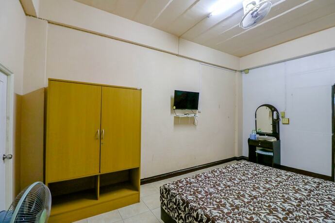 Imagen de la habitación del Hotel OYO 428 Pha Mansion. Foto 8