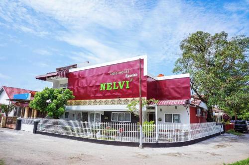 Imagen general del Hotel OYO 433 Nelvi Guest House Syariah. Foto 1