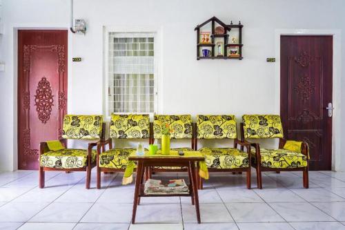 Imagen general del Hotel OYO 433 Nelvi Guest House Syariah. Foto 3