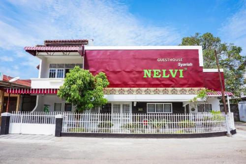 Imagen general del Hotel OYO 433 Nelvi Guest House Syariah. Foto 5