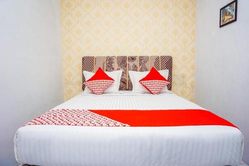 Imagen general del Hotel OYO 433 Nelvi Guest House Syariah. Foto 14