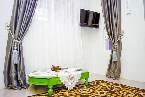 Imagen general del Hotel OYO 433 Nelvi Guest House Syariah. Foto 17