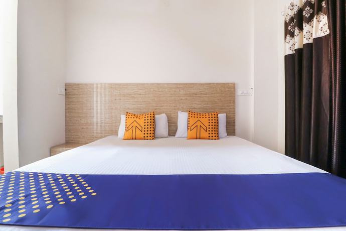 Imagen de la habitación del Hotel OYO 43300 Spring Woods Suites. Foto 3