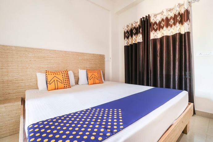 Imagen de la habitación del Hotel OYO 43300 Spring Woods Suites. Foto 5