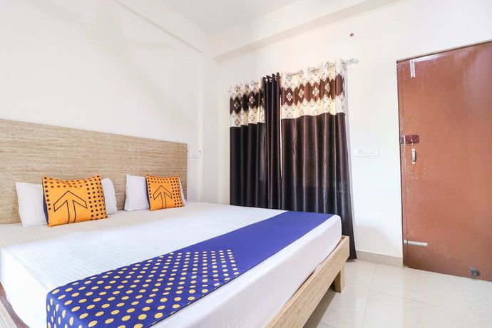 Imagen de la habitación del Hotel OYO 43300 Spring Woods Suites. Foto 8