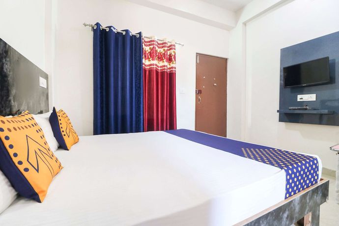 Imagen de la habitación del Hotel OYO 43300 Spring Woods Suites. Foto 9