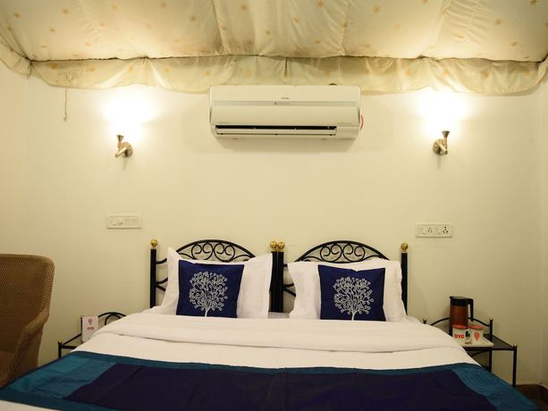 Imagen de la habitación del Hotel OYO 4353 Aravali Tent Resort. Foto 8