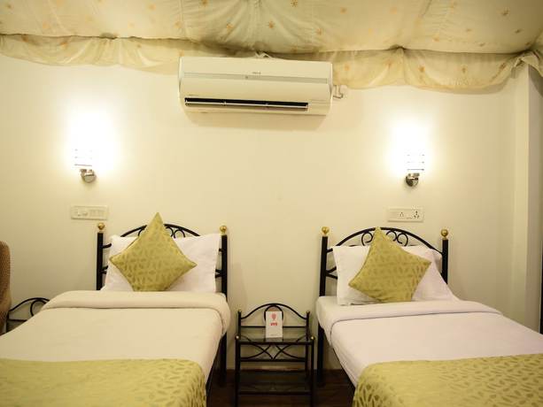 Imagen de la habitación del Hotel OYO 4353 Aravali Tent Resort. Foto 9