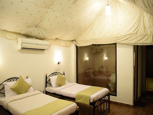 Imagen de la habitación del Hotel OYO 4353 Aravali Tent Resort. Foto 17