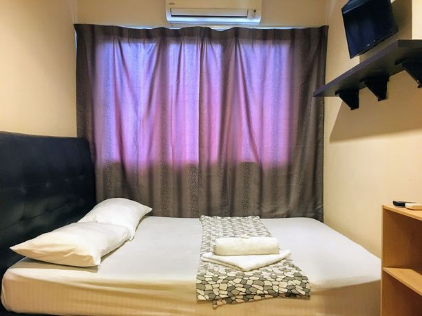 Imagen de la habitación del Hotel OYO 43927 Sassana. Foto 2