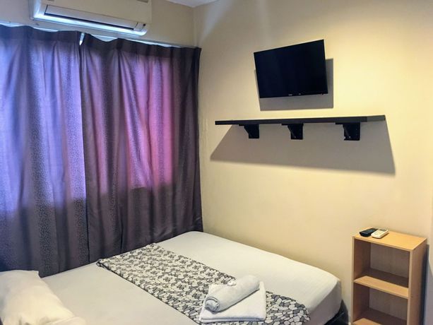 Imagen de la habitación del Hotel OYO 43927 Sassana. Foto 5