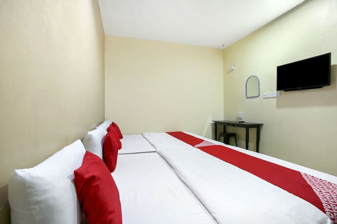 Imagen de la habitación del Hotel OYO 43933 Ferringhi Stay IInn. Foto 12