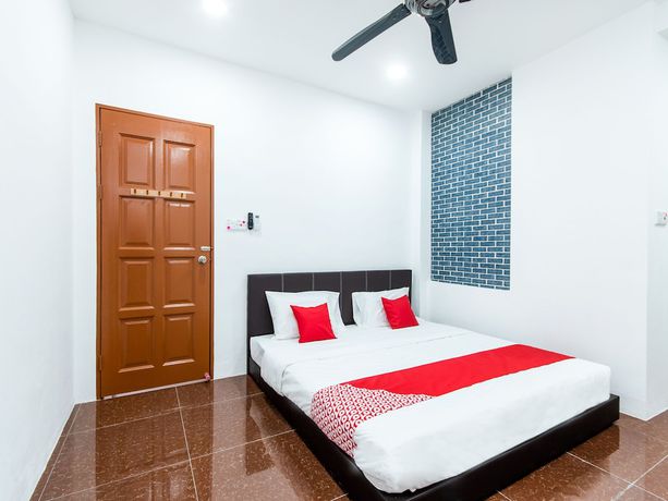 Imagen de la habitación del Hotel OYO 44011 Weng Bee Guest House. Foto 2