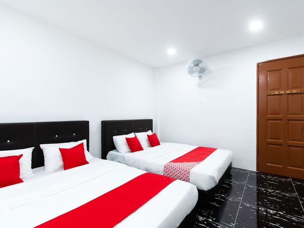 Imagen de la habitación del Hotel OYO 44011 Weng Bee Guest House. Foto 3