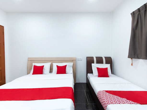 Imagen de la habitación del Hotel OYO 44011 Weng Bee Guest House. Foto 5