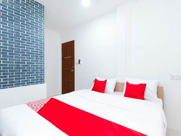Imagen de la habitación del Hotel OYO 44011 Weng Bee Guest House. Foto 6