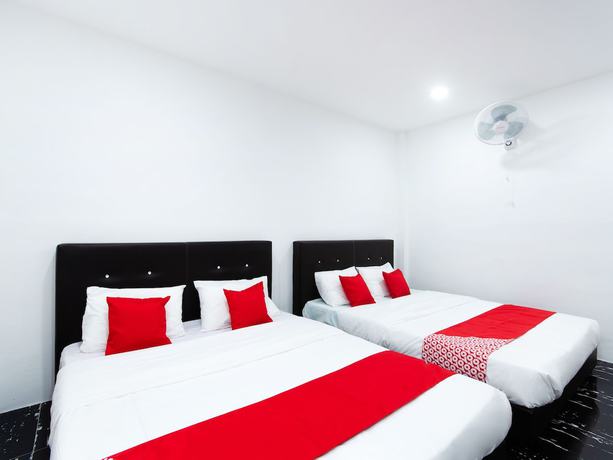 Imagen de la habitación del Hotel OYO 44011 Weng Bee Guest House. Foto 7