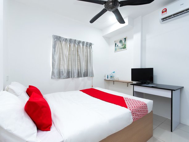 Imagen de la habitación del Hotel OYO 44011 Weng Bee Guest House. Foto 8
