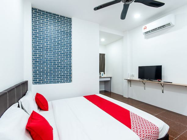 Imagen de la habitación del Hotel OYO 44011 Weng Bee Guest House. Foto 9