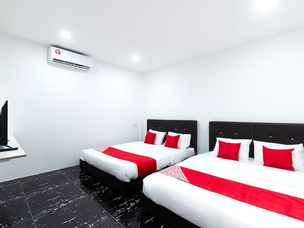Imagen de la habitación del Hotel OYO 44011 Weng Bee Guest House. Foto 10
