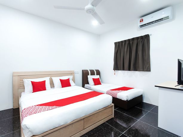 Imagen de la habitación del Hotel OYO 44011 Weng Bee Guest House. Foto 11