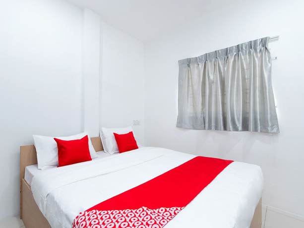 Imagen de la habitación del Hotel OYO 44011 Weng Bee Guest House. Foto 13