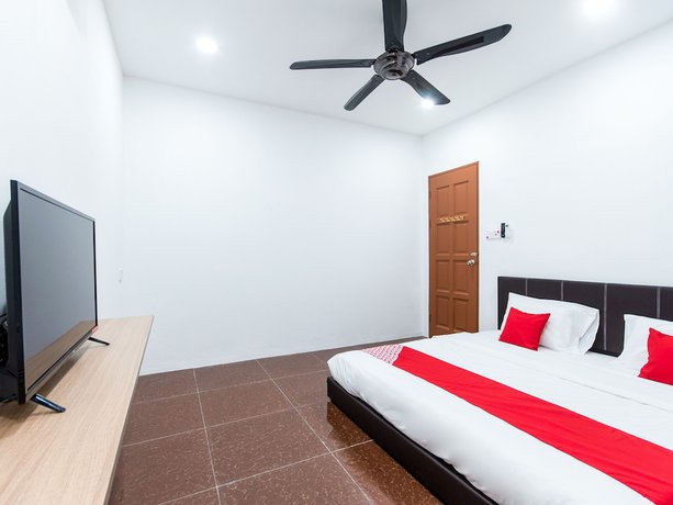 Imagen de la habitación del Hotel OYO 44011 Weng Bee Guest House. Foto 14