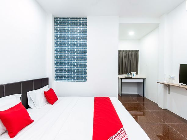 Imagen de la habitación del Hotel OYO 44011 Weng Bee Guest House. Foto 15