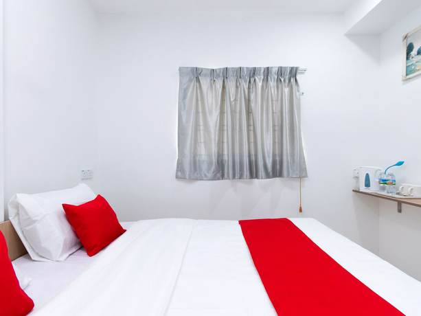 Imagen de la habitación del Hotel OYO 44011 Weng Bee Guest House. Foto 16