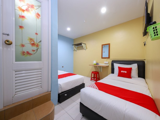 Imagen de la habitación del Hotel OYO 44016 Rafik Ali Motel. Foto 4