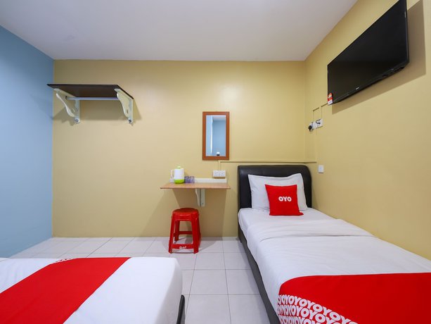 Imagen de la habitación del Hotel OYO 44016 Rafik Ali Motel. Foto 10