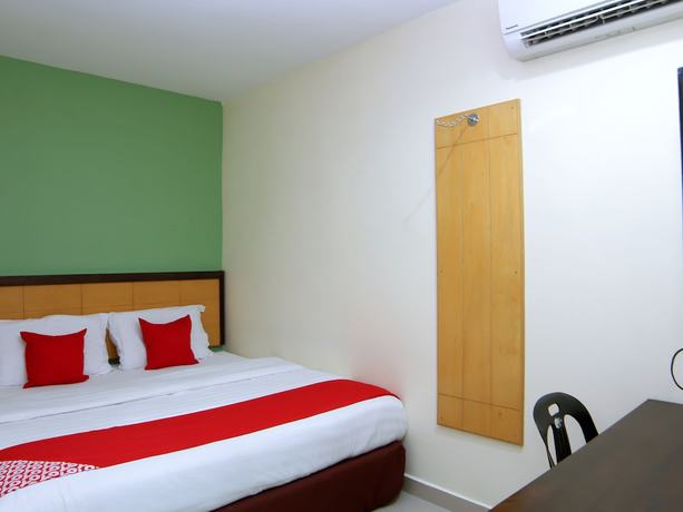 Imagen de la habitación del Hotel OYO 44054 Holiday Mansion Inn. Foto 3