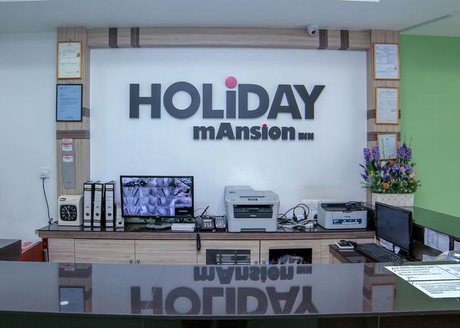 Imagen de los interiores del Hotel OYO 44054 Holiday Mansion Inn. Foto 18