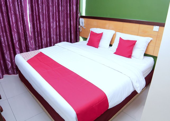 Imagen de la habitación del Hotel OYO 44054 Holiday Mansion Inn. Foto 8