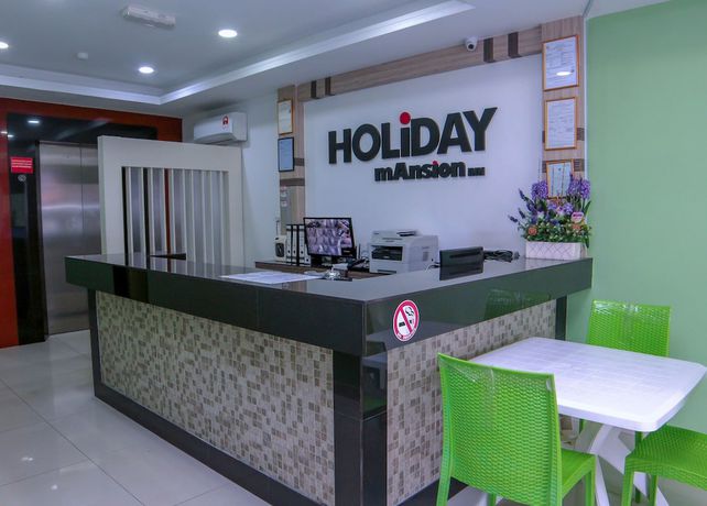 Imagen de los interiores del Hotel OYO 44054 Holiday Mansion Inn. Foto 19