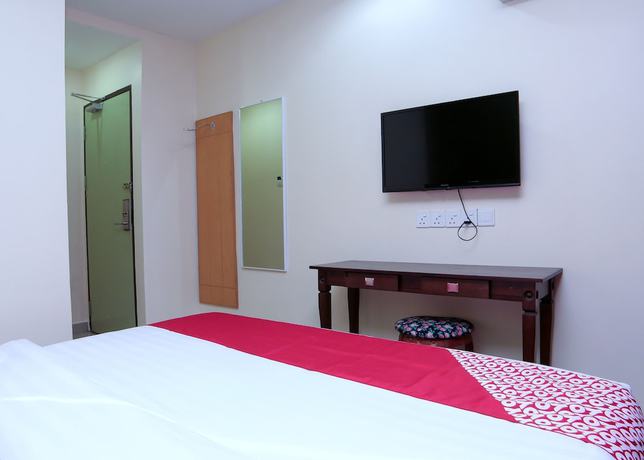 Imagen de la habitación del Hotel OYO 44054 Holiday Mansion Inn. Foto 16