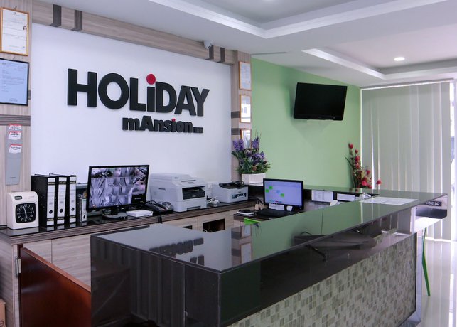 Imagen de los interiores del Hotel OYO 44054 Holiday Mansion Inn. Foto 20