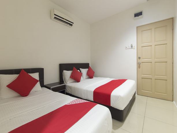 Imagen de la habitación del Hotel OYO 44072 Mines Cempaka. Foto 5