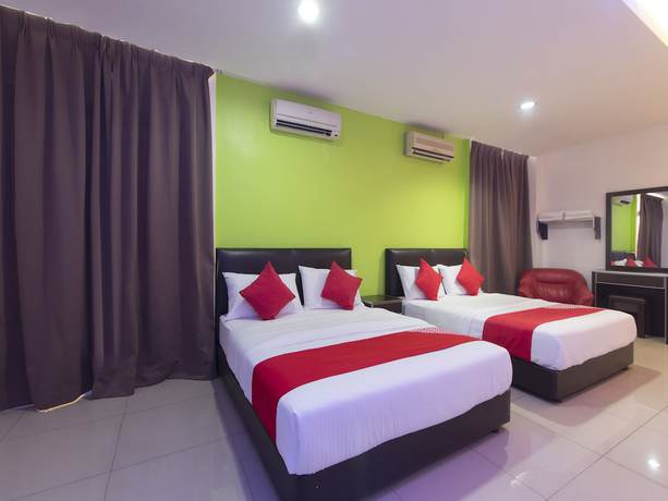 Imagen de la habitación del Hotel OYO 44072 Mines Cempaka. Foto 9