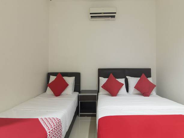 Imagen de la habitación del Hotel OYO 44072 Mines Cempaka. Foto 18