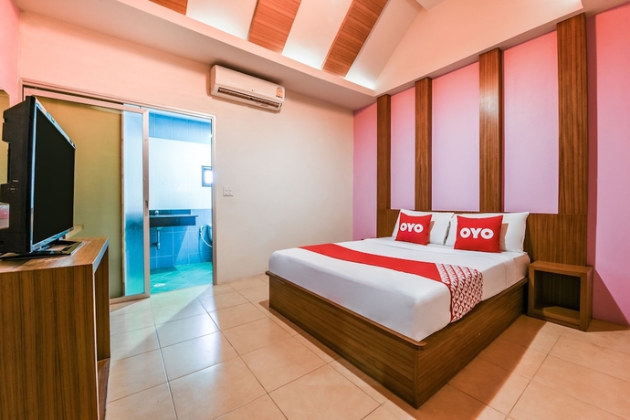 Imagen de la habitación del Hotel OYO 442 Suan Palm Garden View. Foto 14